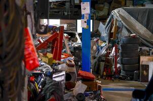 Organized Chaos in an Auto Workshop A Look Inside a Mechanic's Workspace photo