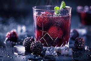 Blackberry and Raspberry Infused Drink with Mint and Ice Cubes photo