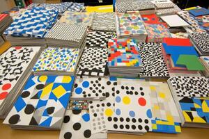 Stacked Papers with Geometric and Abstract Patterns photo