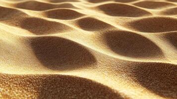 Close-up View of Sunlit Desert Sand Dunes with Subtle Texture photo
