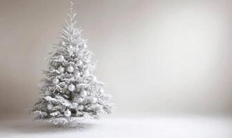 A white Christmas tree with many ornaments on it photo
