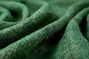 Textured Green Burlap Fabric - Rustic Material Background for Crafts and Design photo