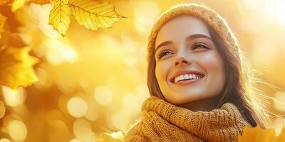 Banner of a happy, cute smiling woman. The girl is situated against a backdrop of yellow autumn leaves. It's a sunny day. Nature, fall, outdoors. Copyspace. Empty area. photo