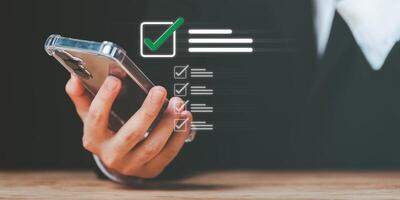 inspector makes mark on the survey topic ,Checklist with checkmarks and checkboxes ,checklist ideas, online quality assessment ,checkbox to conduct opinion and quality surveys or satisfaction photo