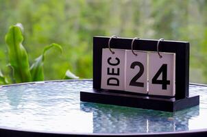24th December table calendar with customizable space for text or ideas. Christmas eve concept photo