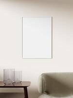 Empty framed canvas for mockups and art illustrations on interior background photo
