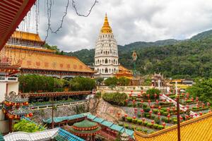 Kek Lok Si Temple on Penang Island. It is hilltop temple complex characterized by colorful, intricate decor and many Buddha images photo