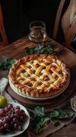 Homemade grape pie with golden lattice crust on table, food blogs, magazines, and bakery ads photo