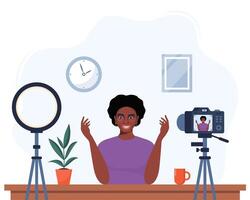 African American woman blogger records herself on using a camera and a circle light lamp. character influencer creating a review for a blog. Flat illustration. vector