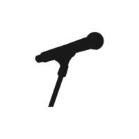 Microphone stand silhouette. Microphone flat black icon in white background. vector