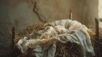 Straw manger in a stable Nativity scene photo
