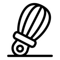 Balloon whisk resting on a table for mixing ingredients vector