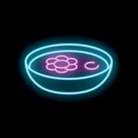 Neon sign of a bowl glowing with hot soup on black background vector