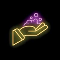 Neon sign of hand holding soap suds on black background vector