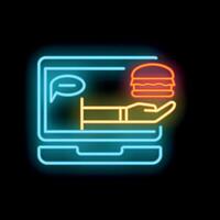 Neon sign of hand delivering burger through laptop screen vector