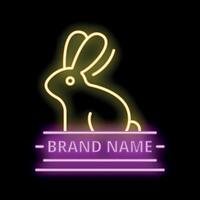 Glowing neon sign of sitting rabbit with a banner for brand name on black background vector