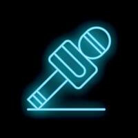 Blue neon microphone is glowing on a black background vector