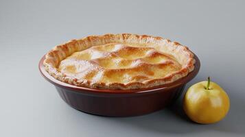 A pie and a lemon on a table photo