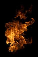 Fire and burning flame of explosive fireball isolated on dark background for abstract graphic design photo