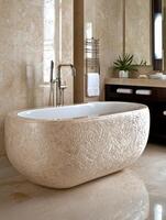 Elegant freestanding bathtub in a luxurious marble bathroom design. photo