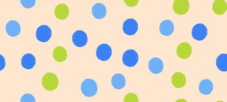 Seamless pattern of irregular crayon dots and splotches with a grunge effect. Abstract polkadot design featuring chaotic blue and green spots. vector