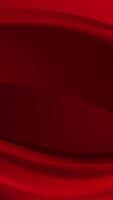 Abstract image featuring deep red swirling curves. Smooth texture with gradient vector