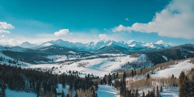 Panoramic drone view of snowy mountains photo
