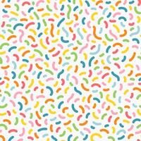 Bright and playful multicolored doodle confetti pattern. Seamless abstract background. vector
