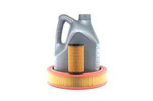 Automotive Oil Container With Air and Oil Filters Displayed photo