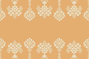 Ethnic pattern cross stitch with cream color background pixel design motif fabric. vector
