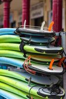 Surf boards in a stack photo