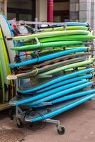 Surf boards in a stack photo