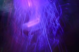 abstract background with light lines of different colors photo