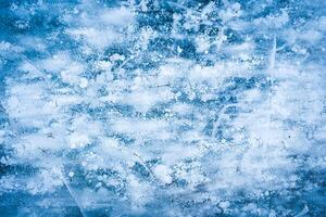 Background. Blue ice with bubbles and cracks. photo