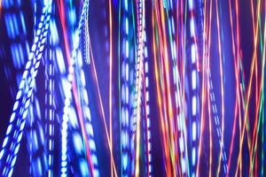 abstract background with light lines of different colors photo