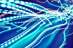 abstract background with light lines of different colors photo