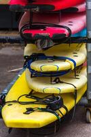Surf boards in a stack photo