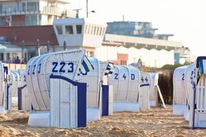 Beach wicker chairs strandkorb in Northern Germany photo