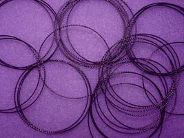 Dark purple circle wire pattern for abstract mysterious background. photo