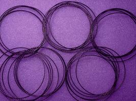 Dark purple circle wire pattern for abstract mysterious background. photo