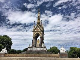 A statue with a cross on top of it photo