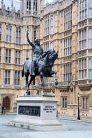 A statue of a man on a horse photo