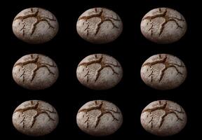 Rustic bread rolls in moody lighting photo
