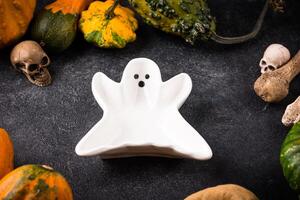 Halloween empty plate in shape of ghost photo
