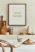 Creative and modern dining room interior design with mock up poster frames, beige sideboard, family dining table and retro inspired personal accessories. Copy space Autumn vibes. photo