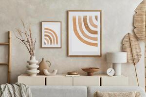 Creative composition of stylish living room with mock up poster frame, sofa, commode clay vases and stylish personal accessories. Pastel neutral colours. Template. photo