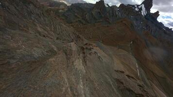 FPV drone descending a mountain slope in Tibet video