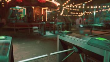 Abandoned amusement park with empty turnstiles and dimly lit atmosphere at dusk video