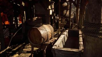 Wooden barrel and container in a rustic workshop during daylight hours video