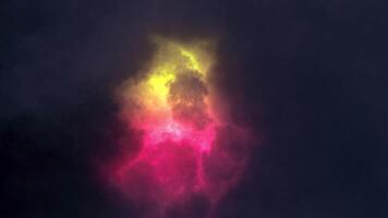 A glowing object floats against a dark backdrop, pulsing with color. Motion video